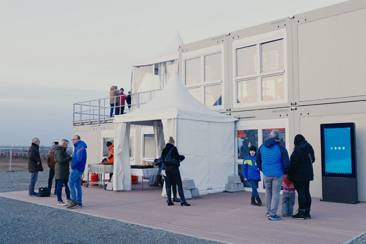 Einladung zur Öffnung des Info-Containers am 31. Januar.