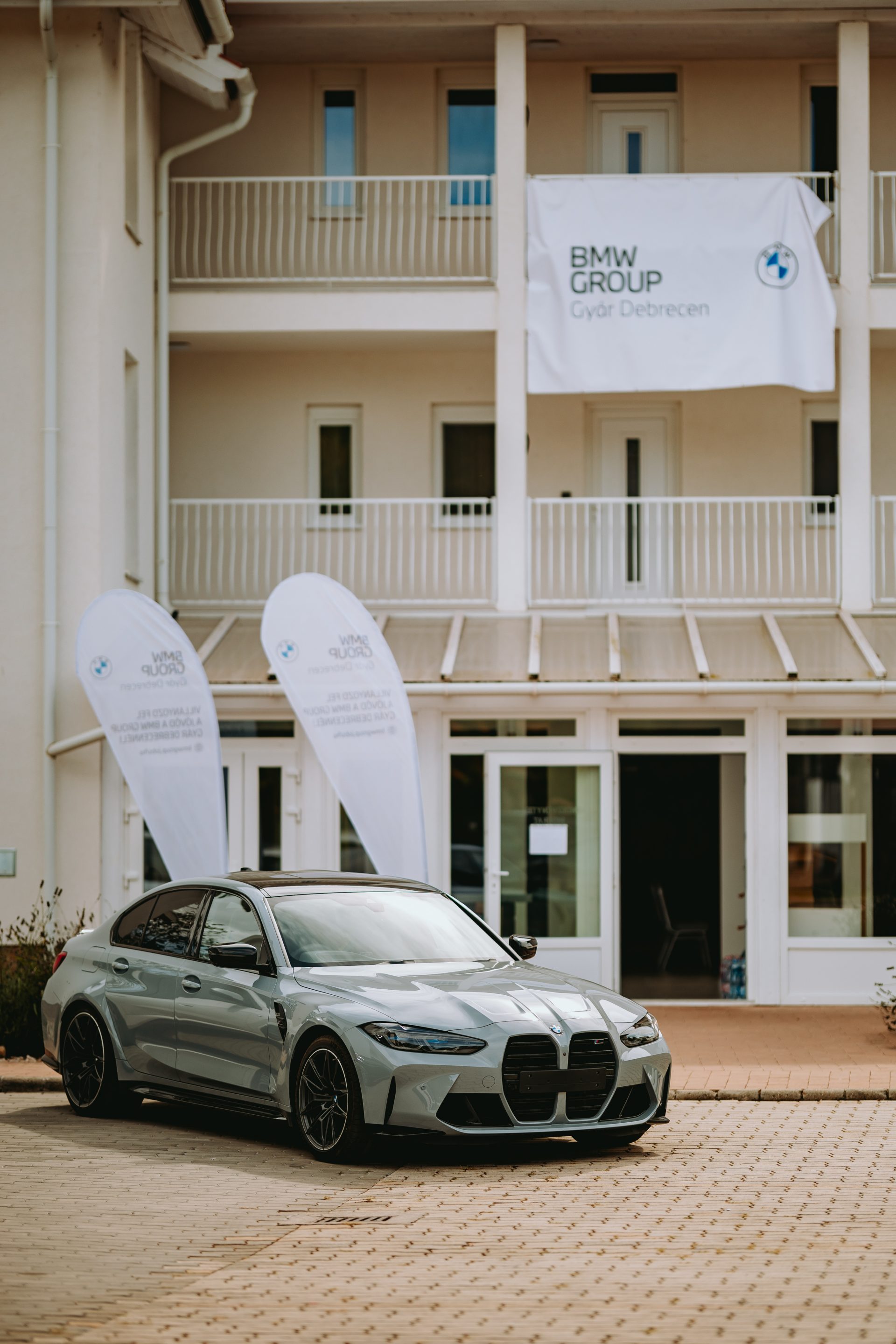 BMW M3 in front of a building