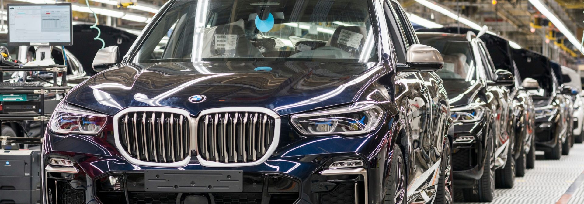 BMW's lined up for final inspection on the assembly finish line. 