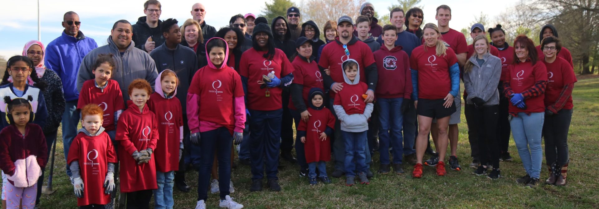 BMW Associates and families volunteer at Trees Upstate tree planting event. 