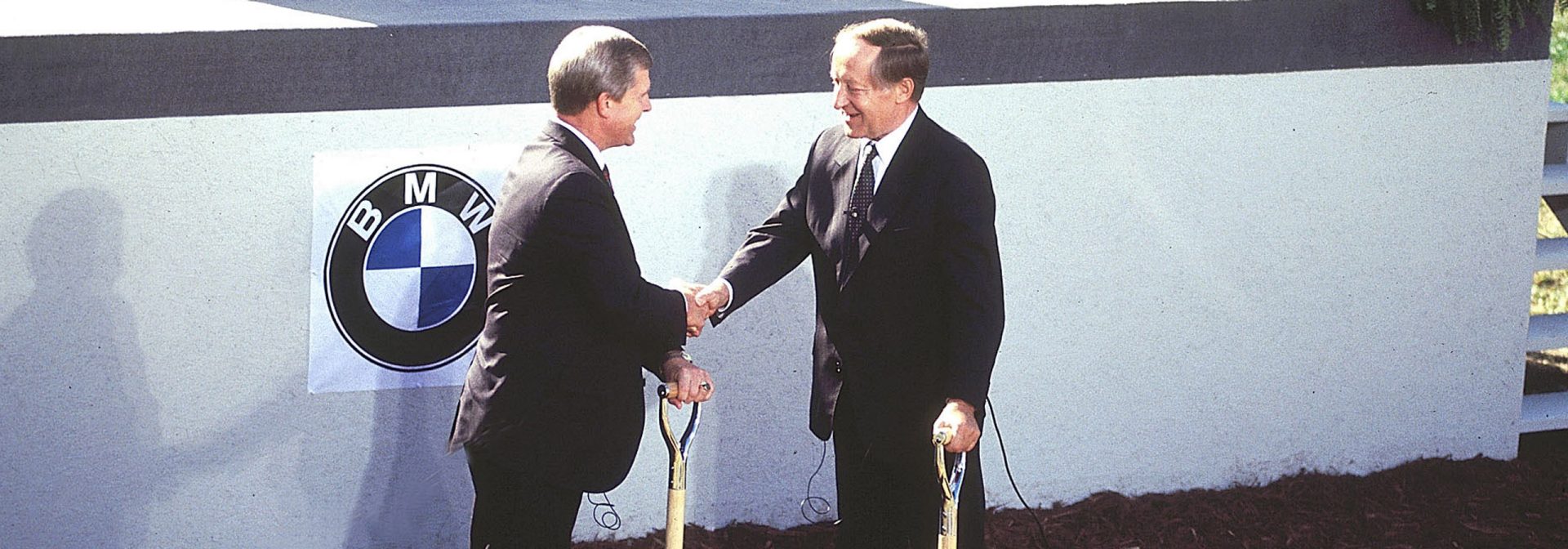 First shovels of dirt and hand shake at the Plant Spartanburg groundbreaking. 