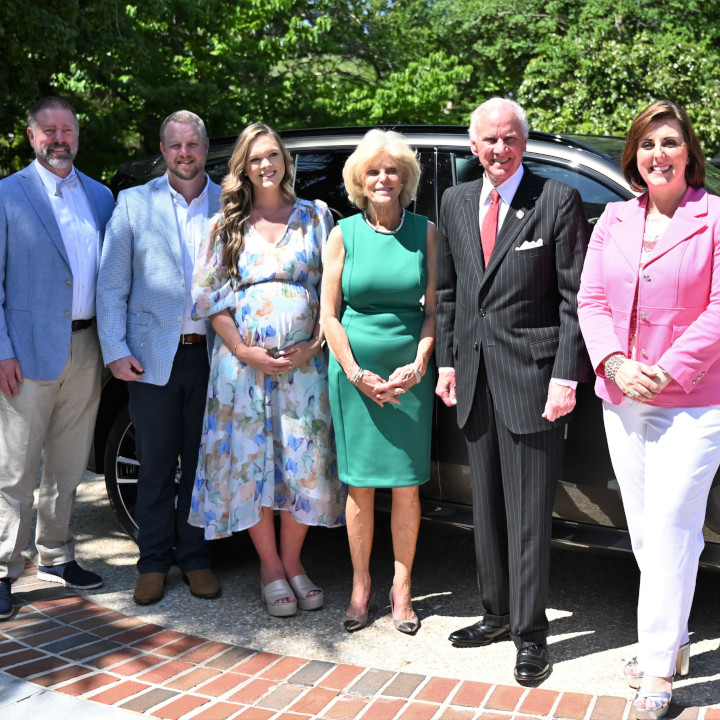 South Carolina Teacher of  the Year is handed the keys to the BMW X5 she will be driving for an entire year. 