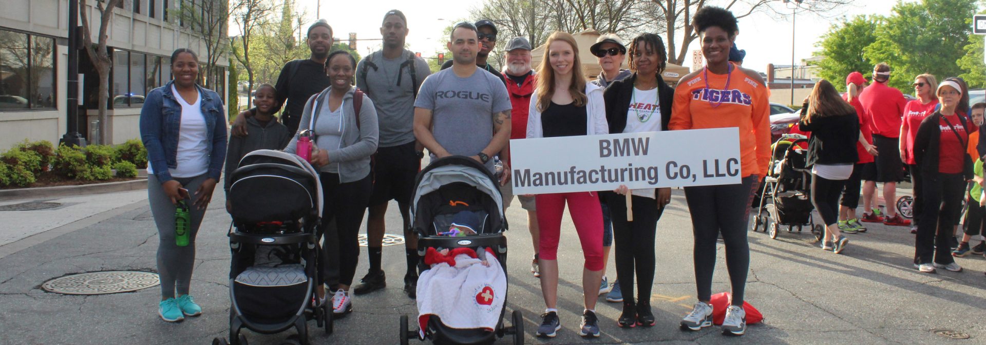 BMW team gathers for a group picture at the American Heart Association's Heart Walk. 